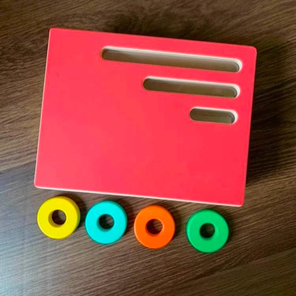 lovevery wooden count and slide ring chute